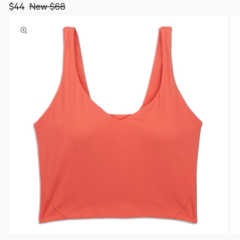 Align cropped tank top color is a hot peachy pink, has bra attached